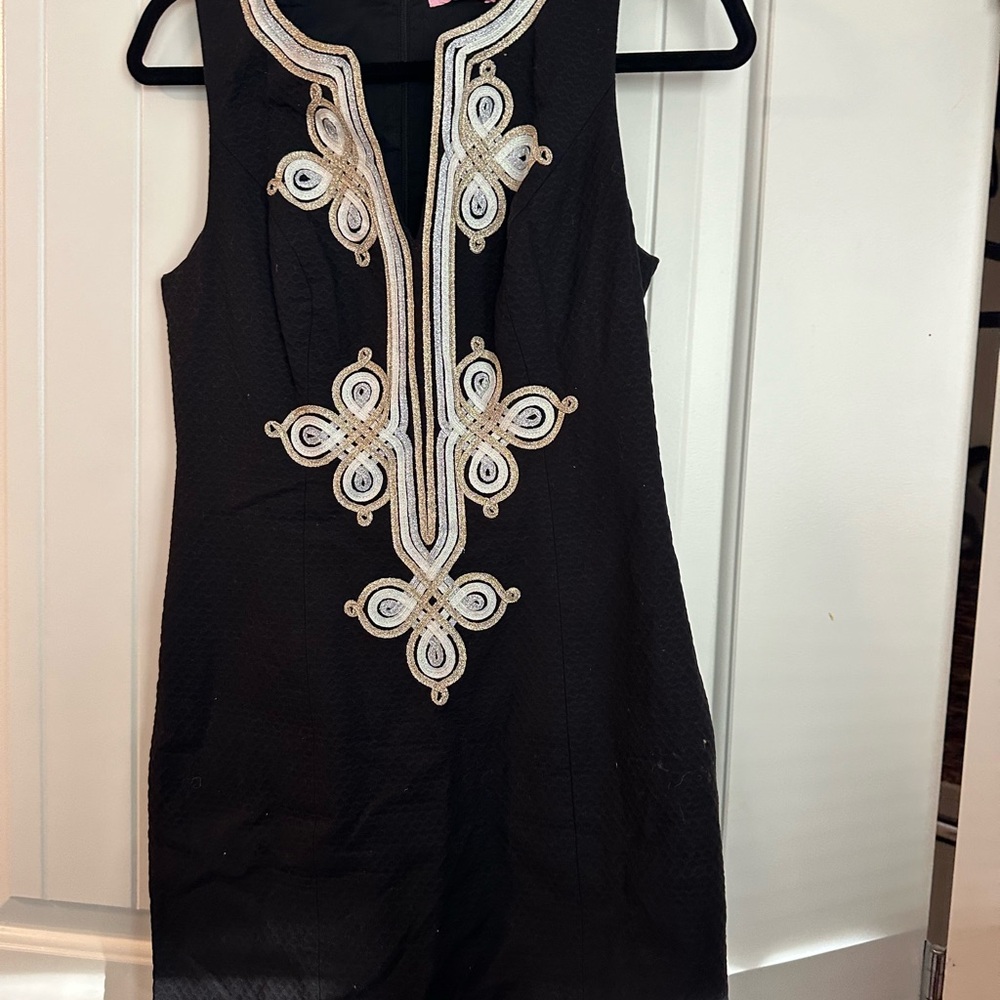 Elegant Black Sleeveless Dress with Intricate Embroidery